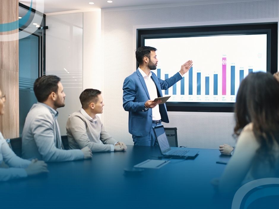 BlogSGSistemas32 Apresentação de gráficos em reunião de negócios