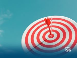 Flecha vermelha no centro de uma diana branca e vermelha